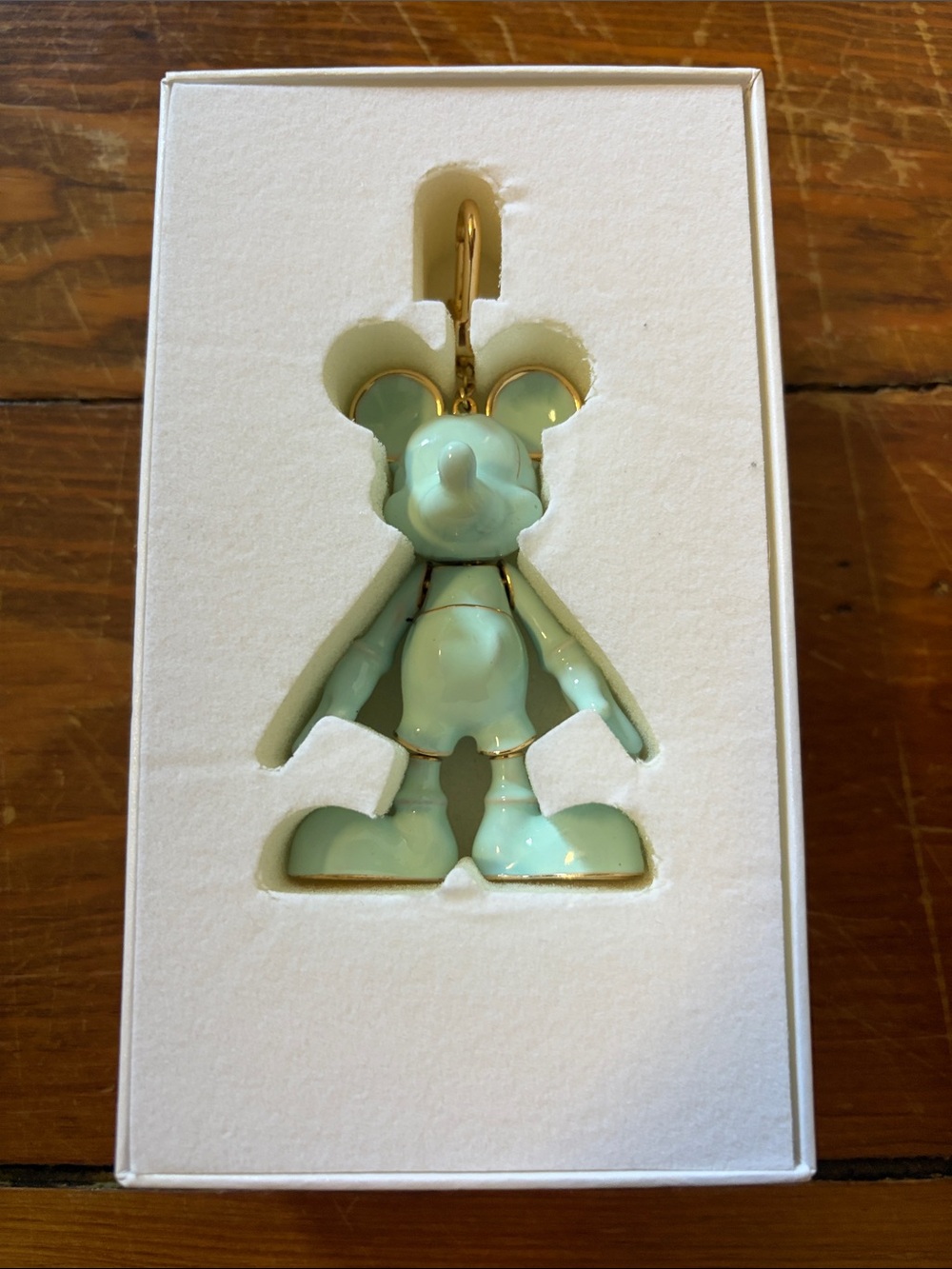 Sky blue baublebar Mickey bag charm.